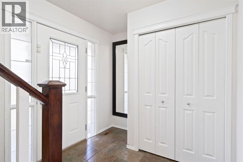 Single Family House for Sale in  Everwillow Close SW Evergreen Calgary 