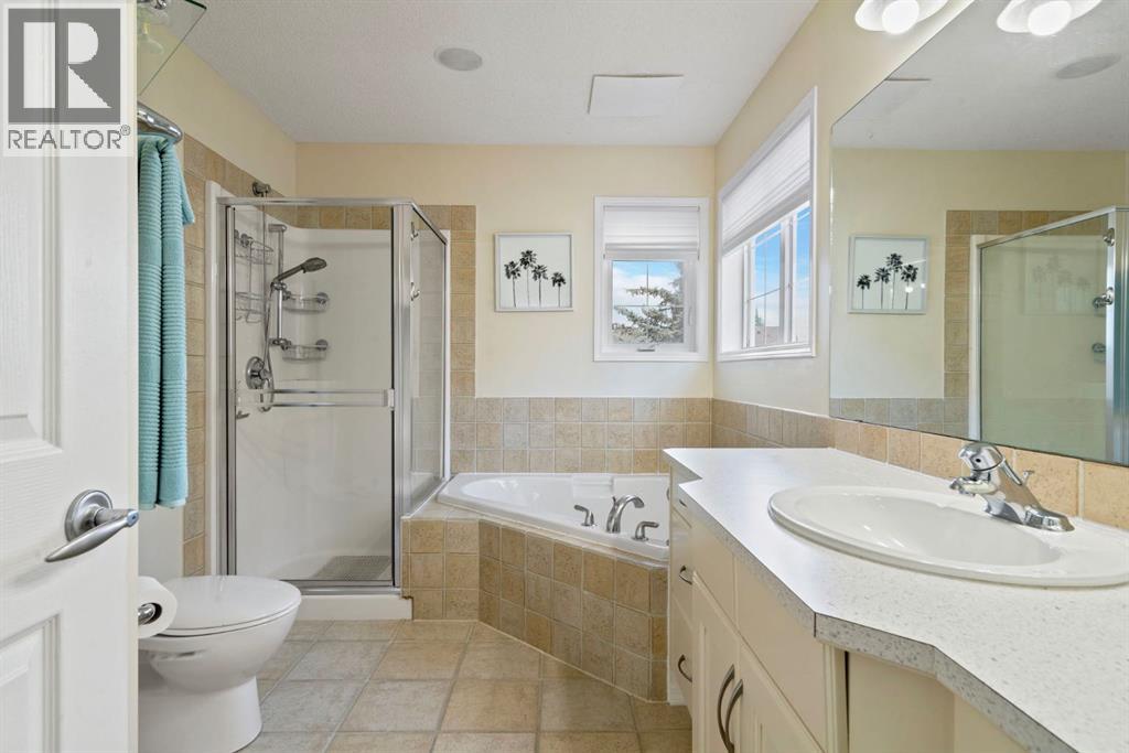 Single Family House for Sale in  Everwillow Close SW Evergreen Calgary 
