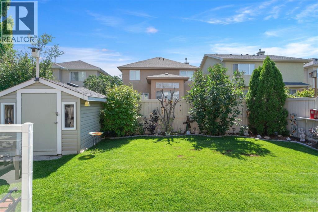 Single Family House for Sale in  Everwillow Close SW Evergreen Calgary 