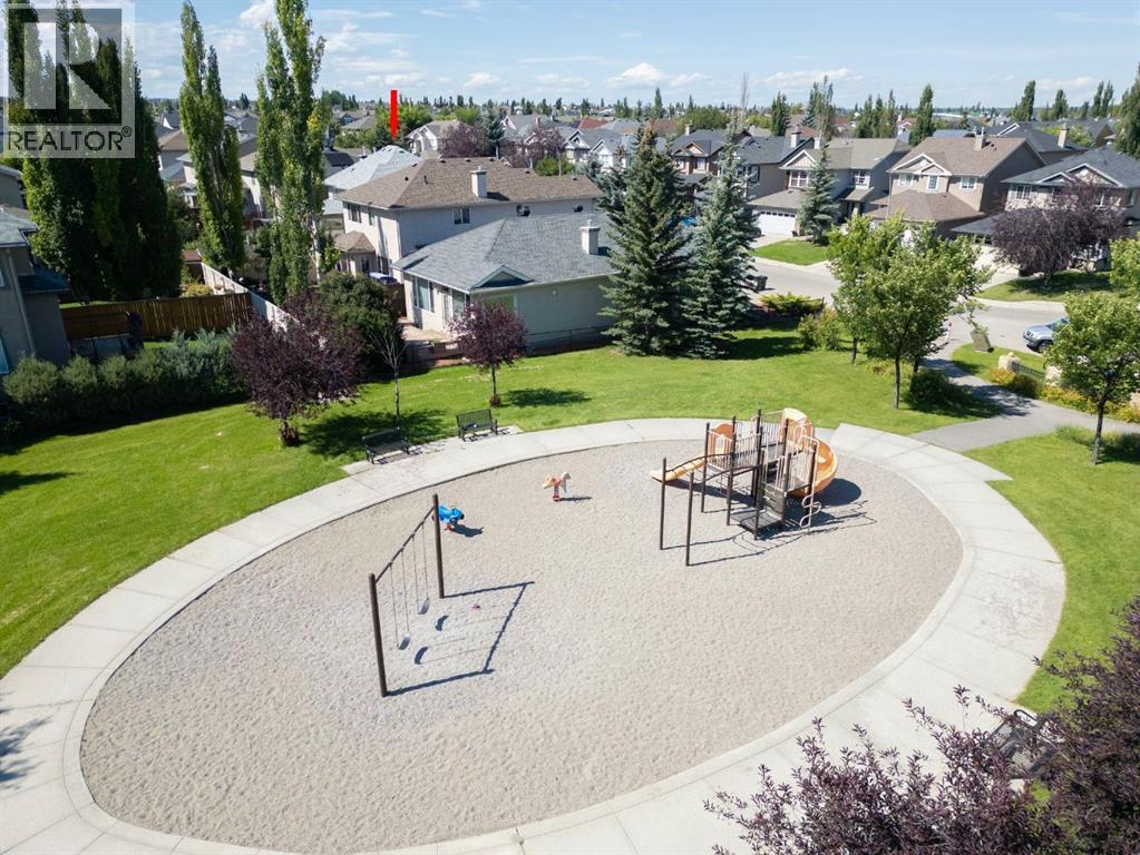 Single Family House for Sale in  Everwillow Close SW Evergreen Calgary 