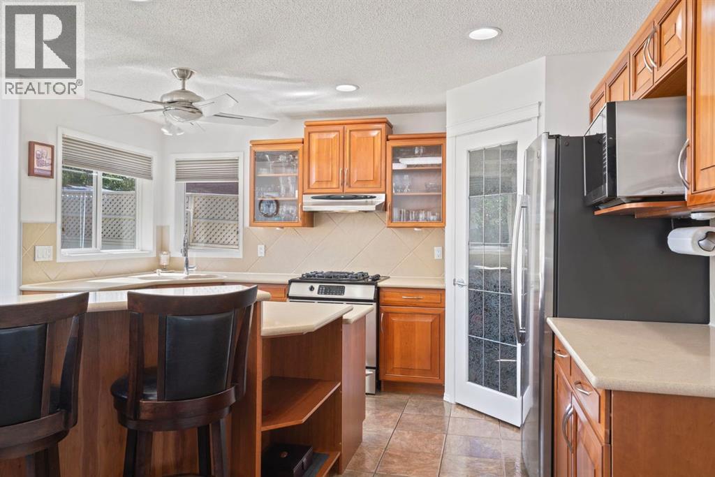 Single Family House for Sale in  Everwillow Close SW Evergreen Calgary 