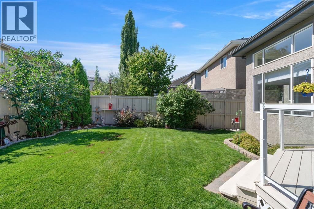 Single Family House for Sale in  Everwillow Close SW Evergreen Calgary 