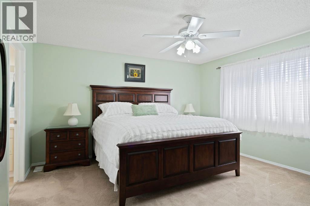 Single Family House for Sale in  Everwillow Close SW Evergreen Calgary 