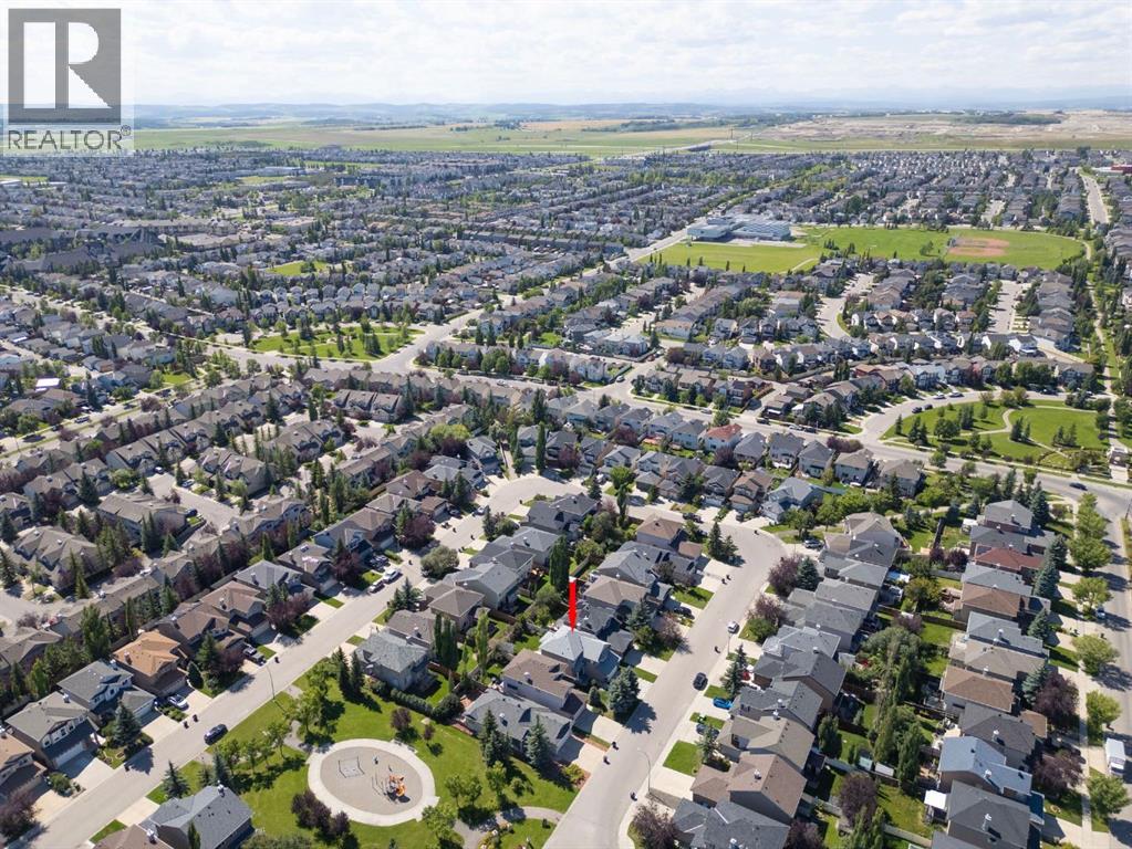 Single Family House for Sale in  Everwillow Close SW Evergreen Calgary 