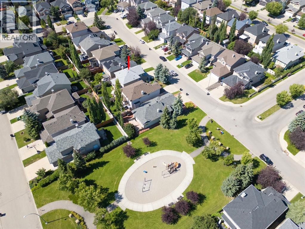 Single Family House for Sale in  Everwillow Close SW Evergreen Calgary 
