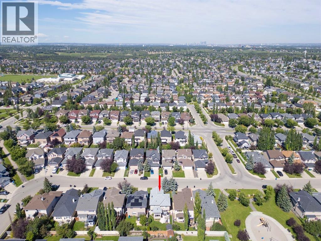 Single Family House for Sale in  Everwillow Close SW Evergreen Calgary 