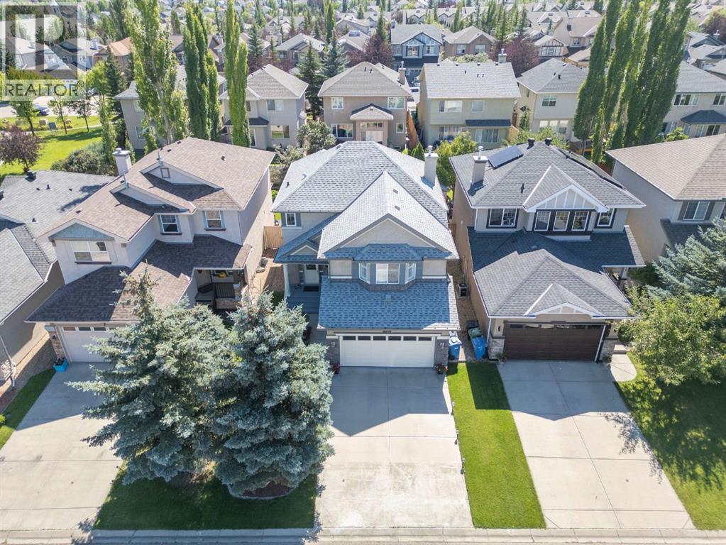 Single Family House for Sale in  Everwillow Close SW Evergreen Calgary 