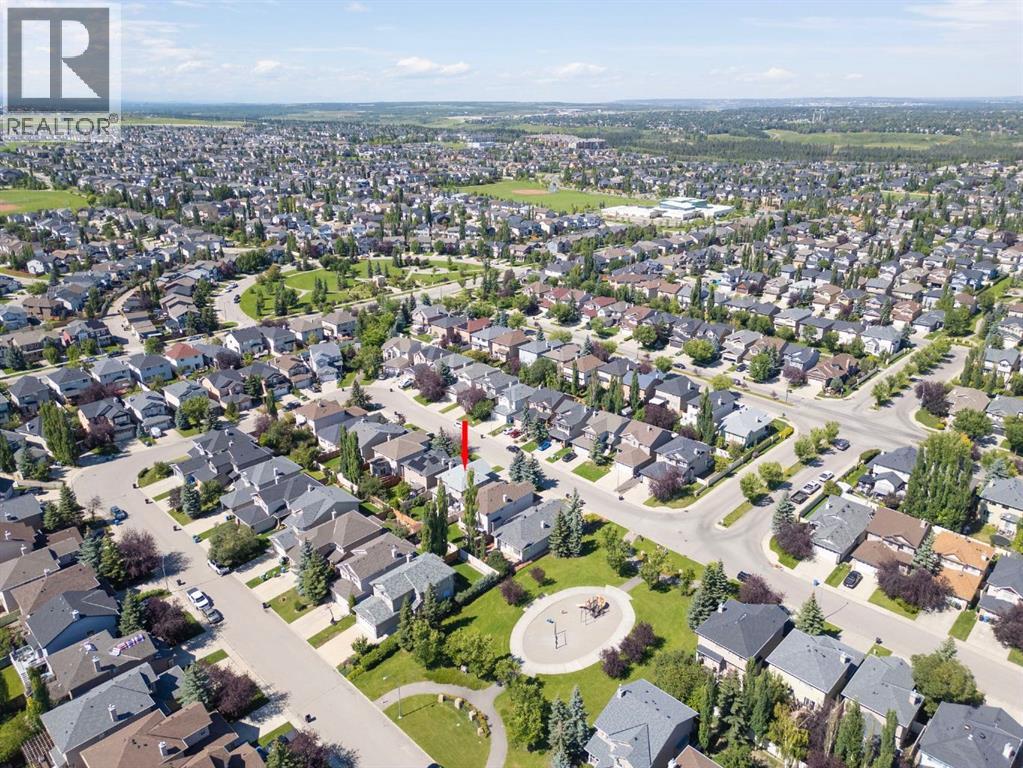 Single Family House for Sale in  Everwillow Close SW Evergreen Calgary 