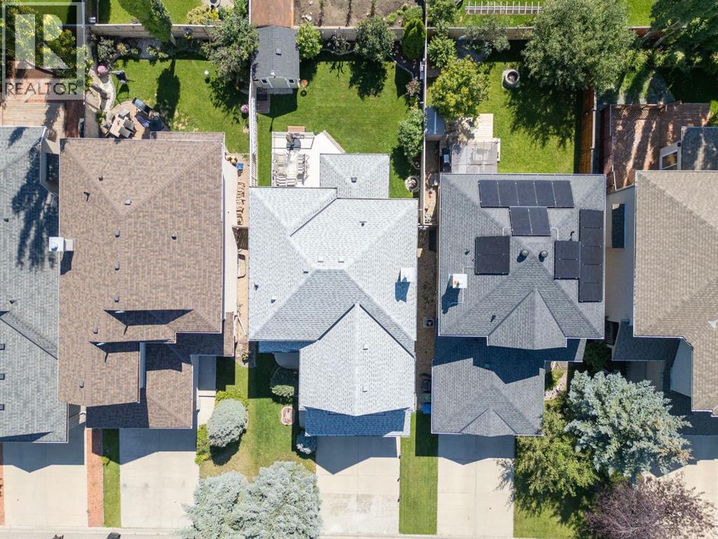 Single Family House for Sale in  Everwillow Close SW Evergreen Calgary 