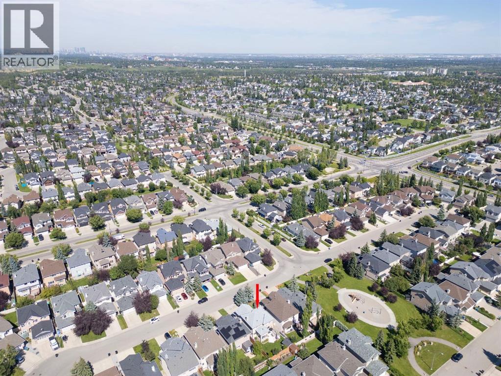 Single Family House for Sale in  Everwillow Close SW Evergreen Calgary 