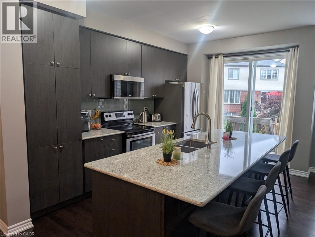 Photo 4 of 44 Postmaster Drive, Kitchener ON