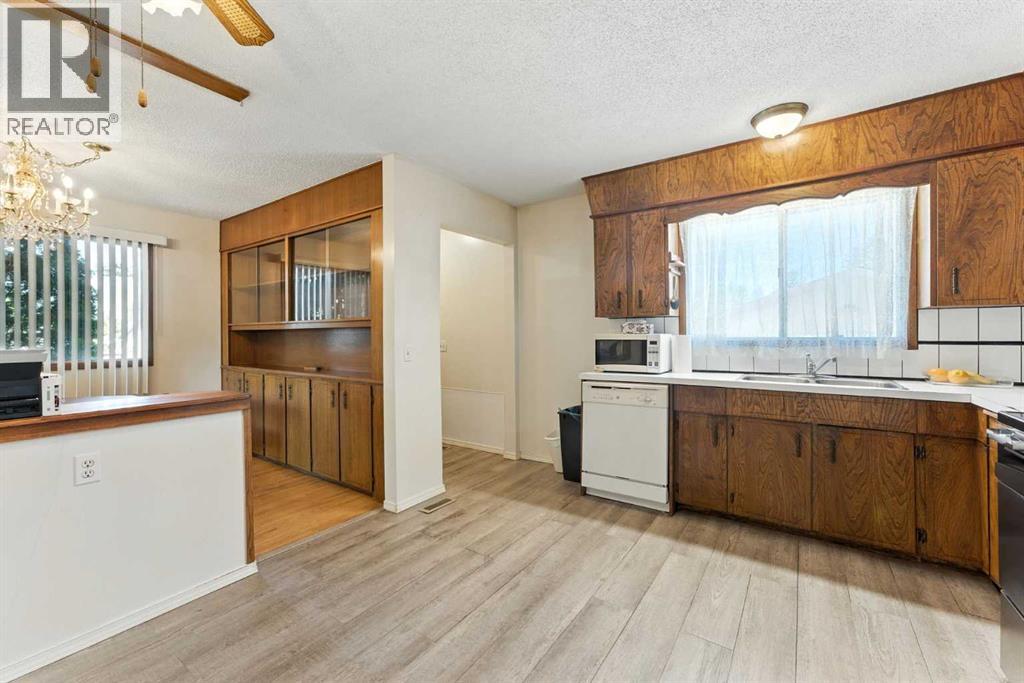 Single Family House Bi-level for Sale in  Madigan Drive NE Marlborough Park Calgary 