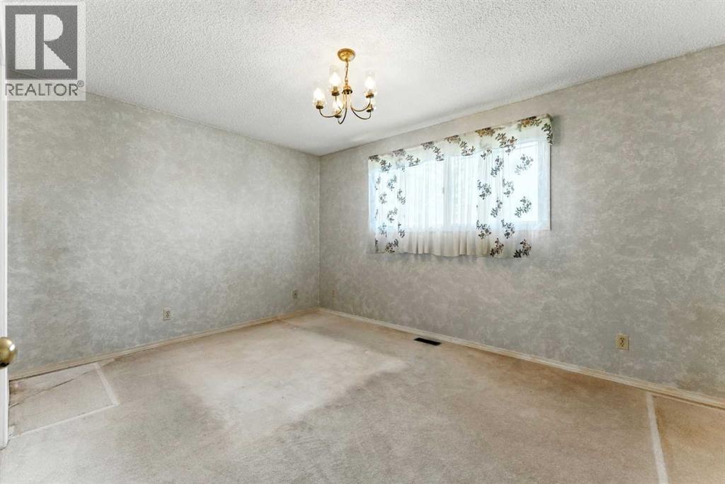 Single Family House Bi-level for Sale in  Madigan Drive NE Marlborough Park Calgary 