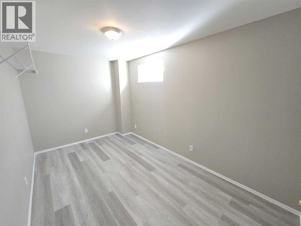 Single Family House Bi-level for Sale in  tarington Manor Taradale Calgary 