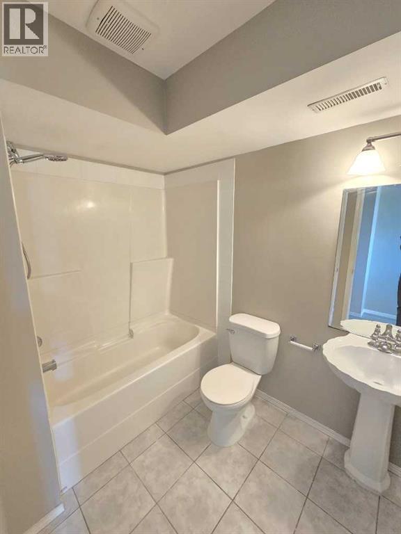 Single Family House Bi-level for Sale in  tarington Manor Taradale Calgary 