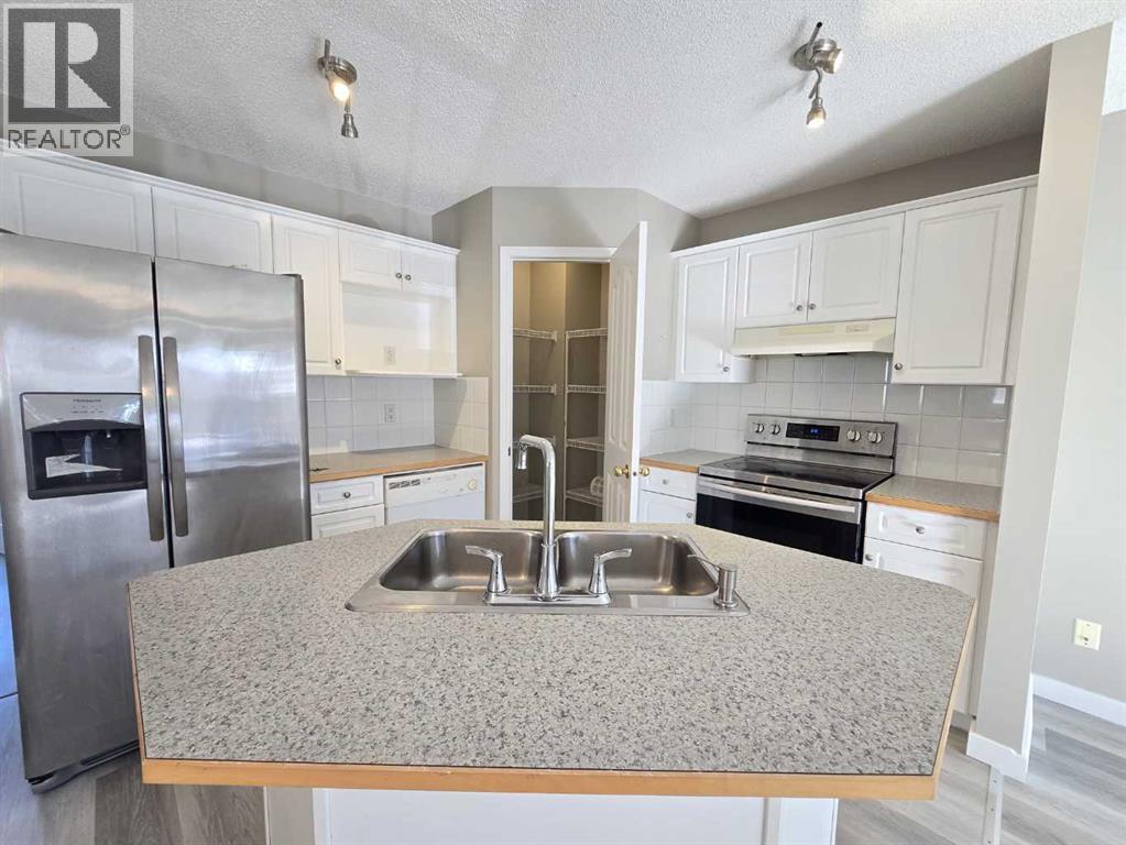Single Family House Bi-level for Sale in  tarington Manor Taradale Calgary 