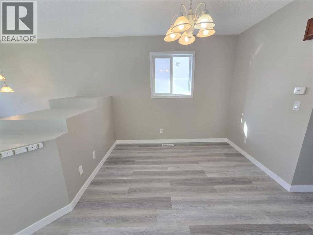 Single Family House Bi-level for Sale in  tarington Manor Taradale Calgary 