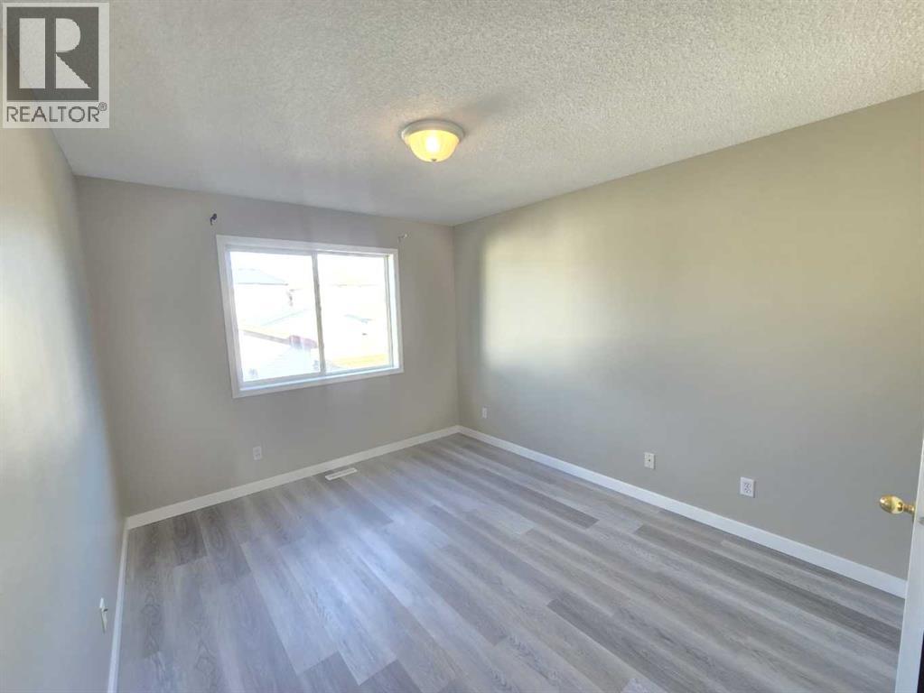 Single Family House Bi-level for Sale in  tarington Manor Taradale Calgary 