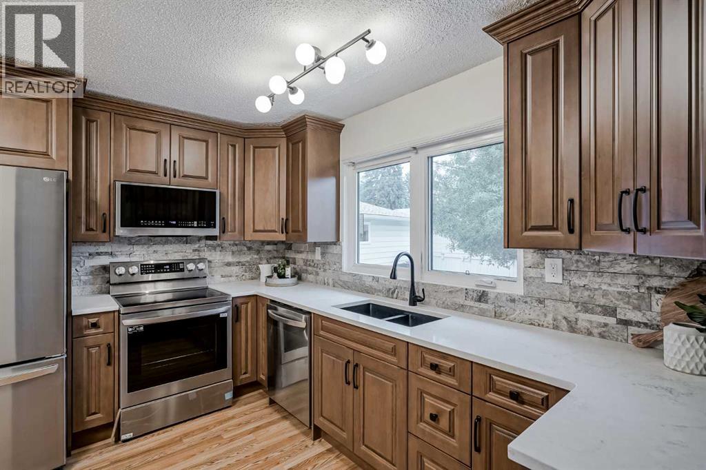 Single Family House Bungalow for Sale in  Huntertown Crescent NW Huntington Hills Calgary 