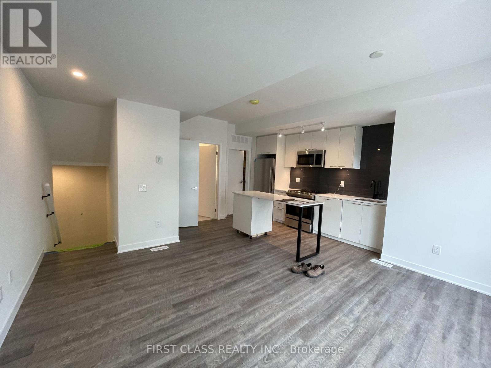 Photo 1 of Th 13 20 Ed Clark Gardens, Toronto ON