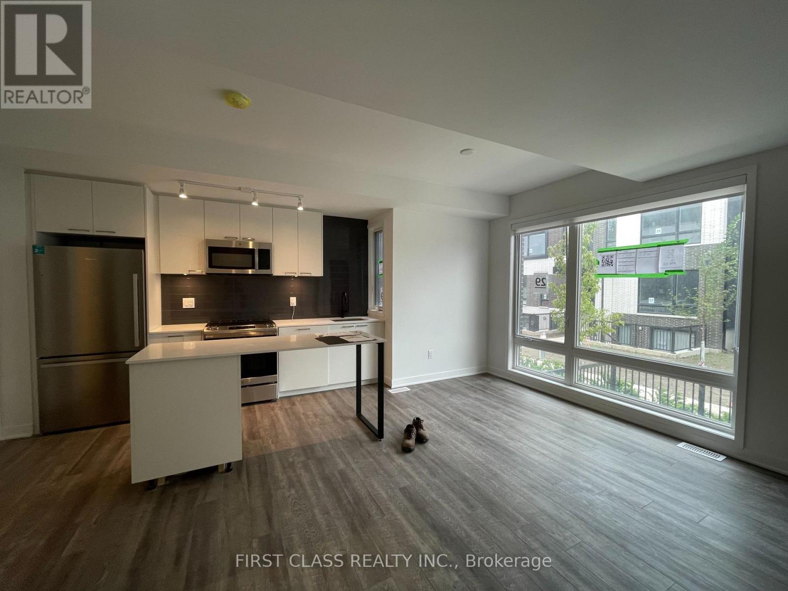 Photo 2 of Th 13 20 Ed Clark Gardens, Toronto ON