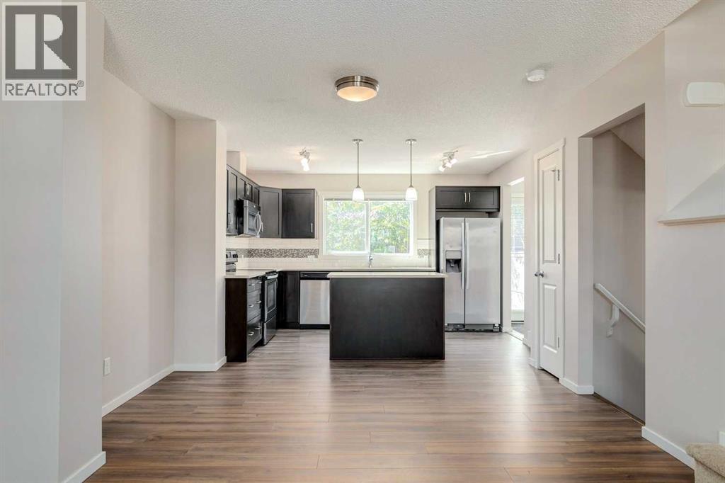 Photo 10 of 44 Sunvalley Road, Cochrane AB