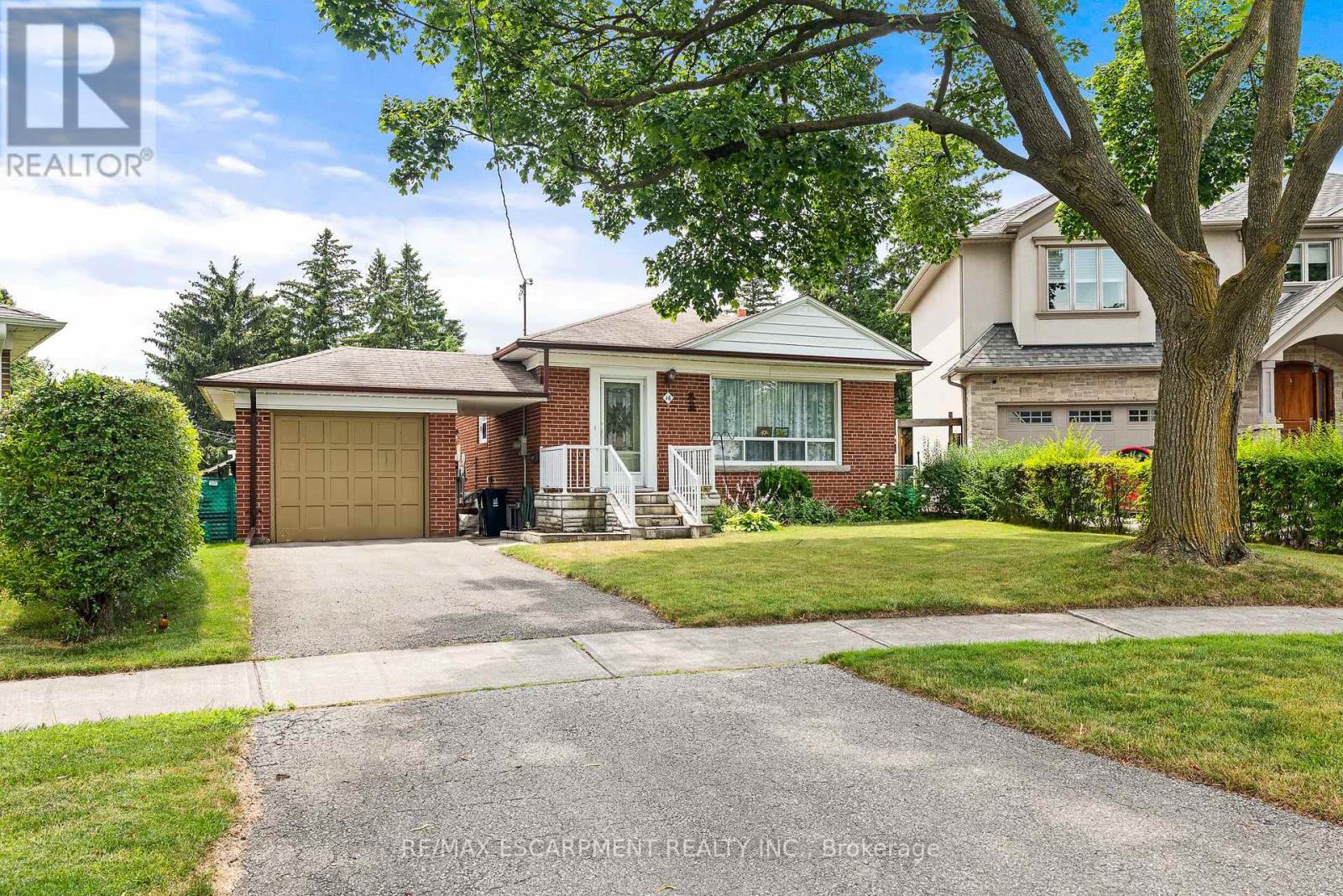 Photo 1 of 16 Northampton Drive, Toronto ON