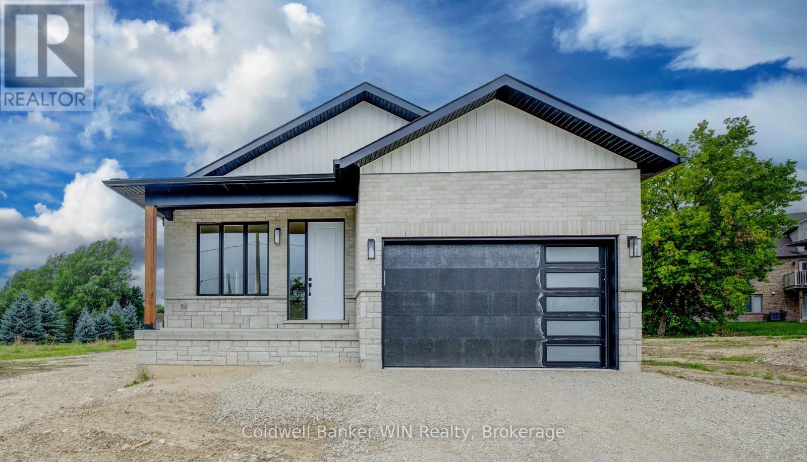 Photo 2 of 647 Martin Street, Wellington North ON