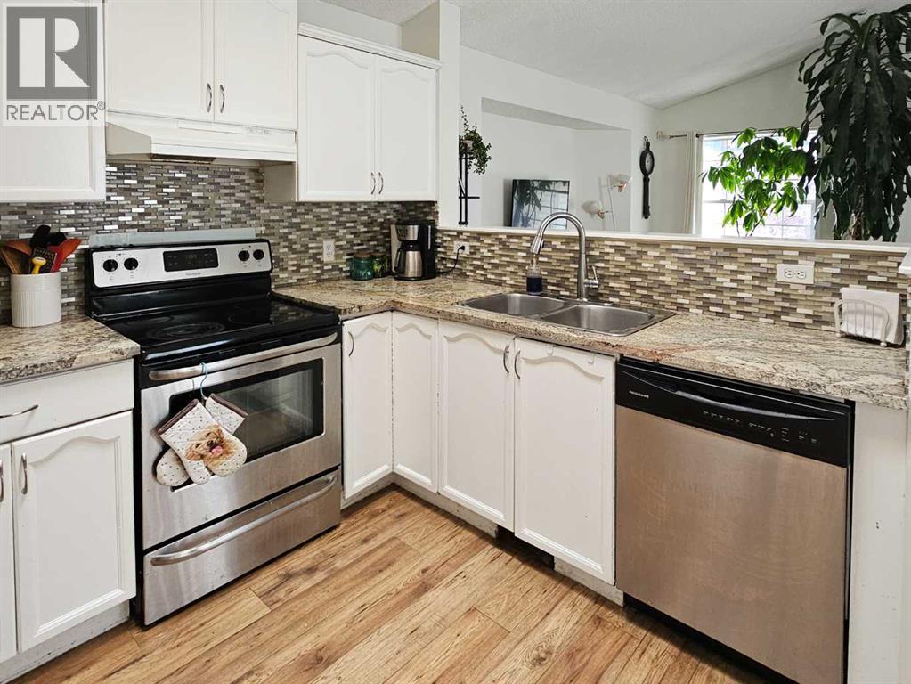 Single Family House Bi-level for Sale in  Hidden Spring Green NW Hidden Valley Calgary 