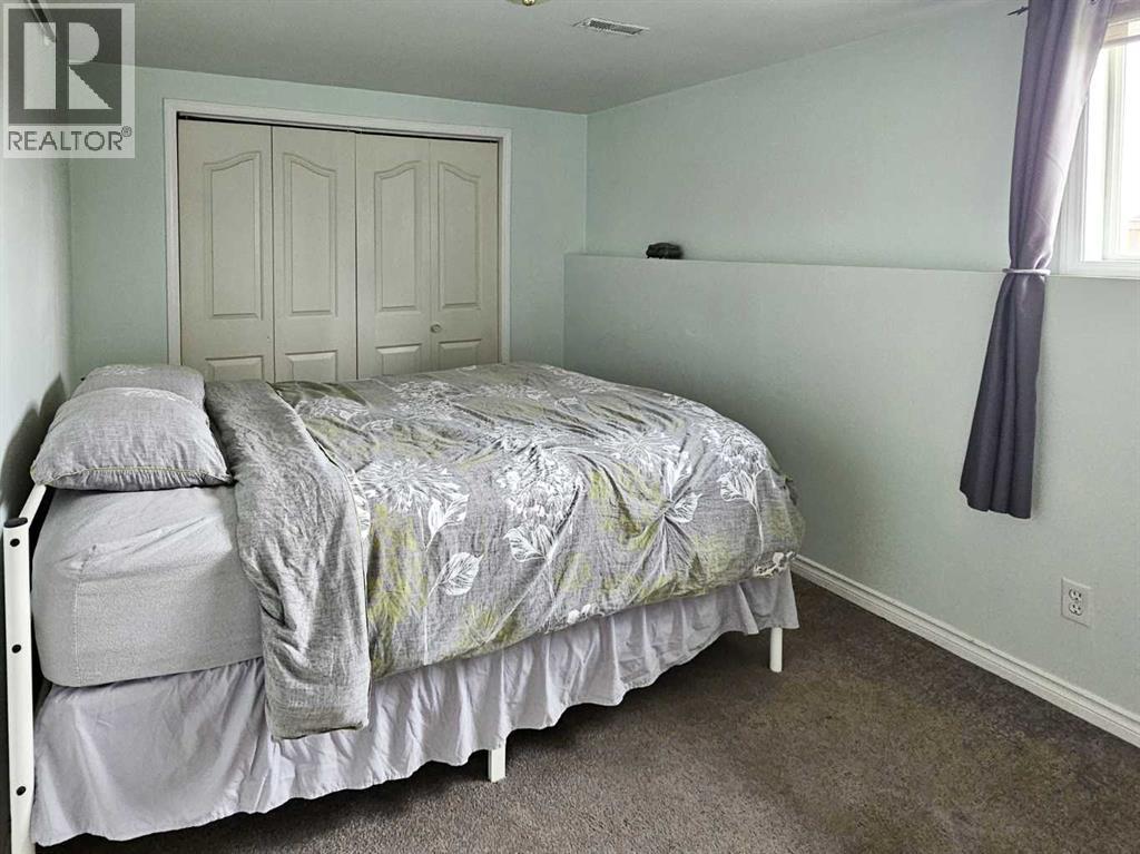 Single Family House Bi-level for Sale in  Hidden Spring Green NW Hidden Valley Calgary 