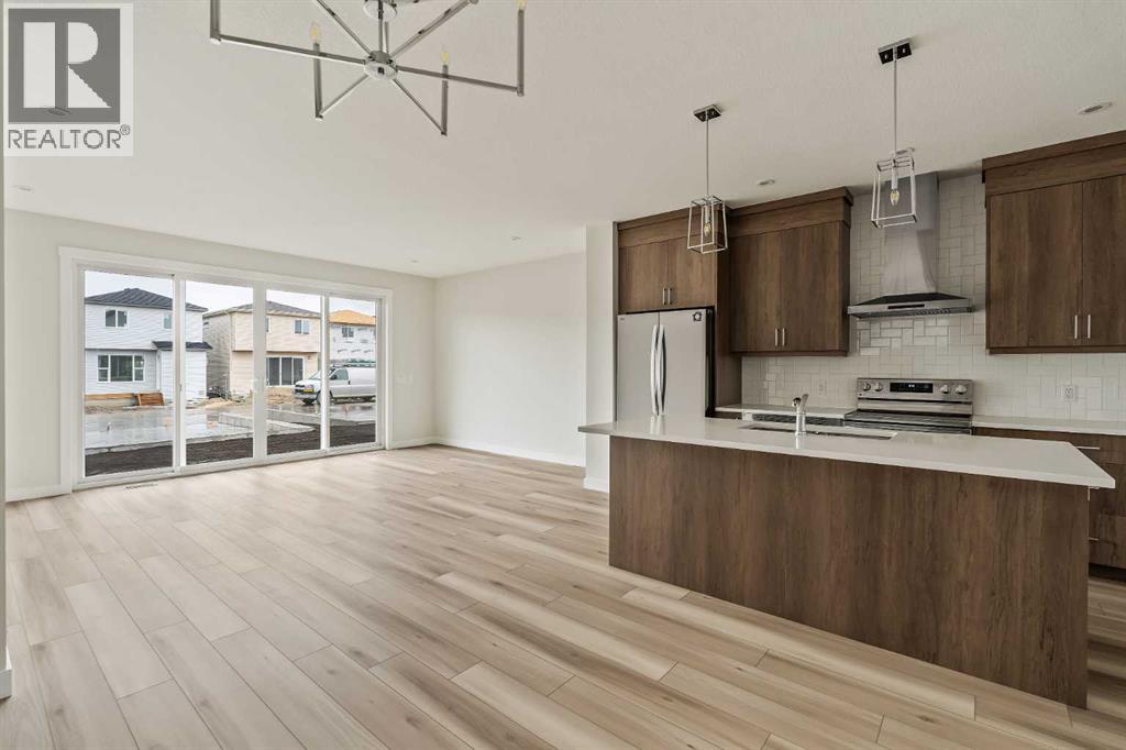 Photo 4 of 1006 Chinook Winds Meadow Sw, Airdrie AB