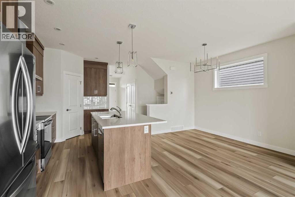 Photo 9 of 1006 Chinook Winds Meadow Sw, Airdrie AB