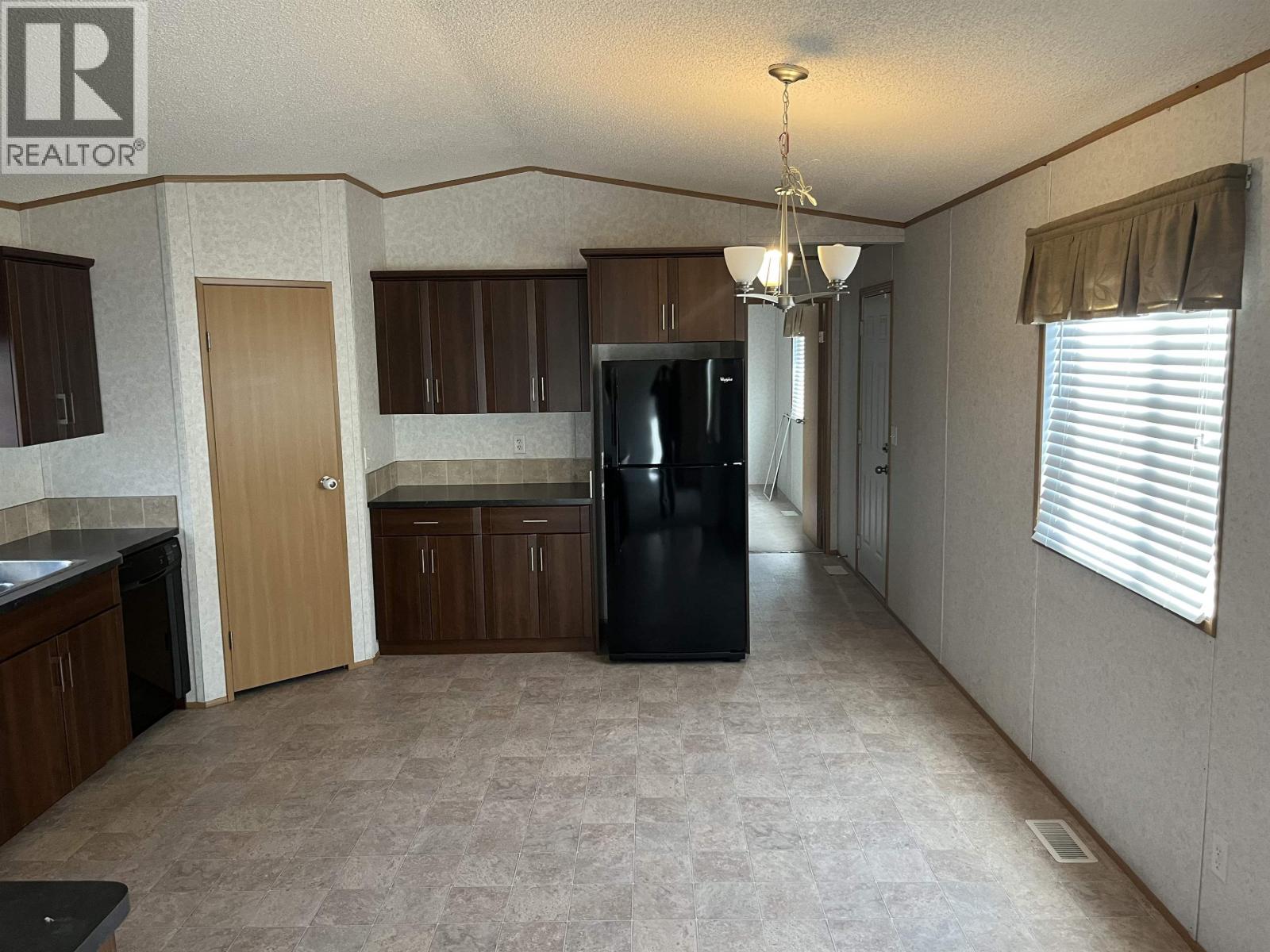 Photo 4 of 8717 79 A Street, Fort St John BC