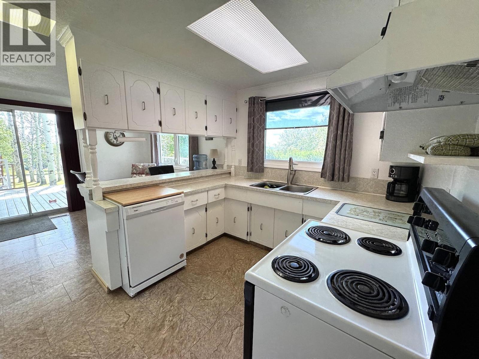 Photo 16 of 12233 Pacific Avenue, Fort St John BC