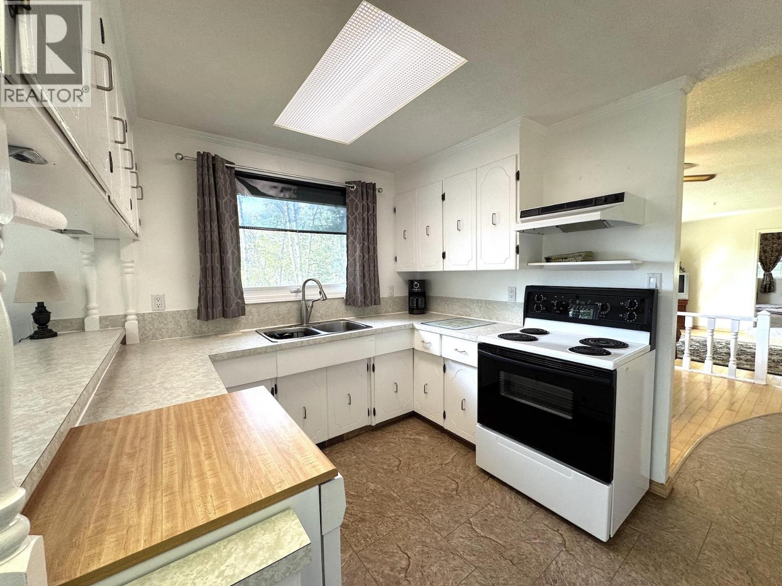 Photo 3 of 12233 Pacific Avenue, Fort St John BC