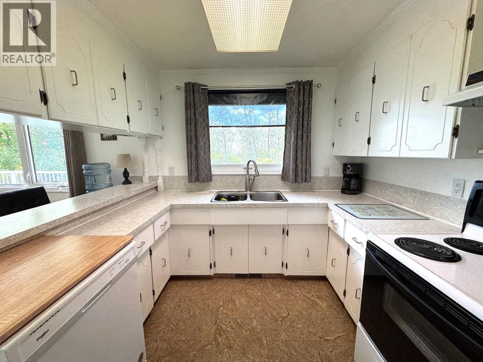 Photo 5 of 12233 Pacific Avenue, Fort St John BC