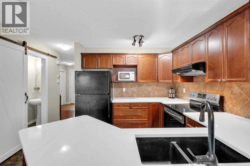 Photo 27 of 169 Crystal Shores Grove, Okotoks AB