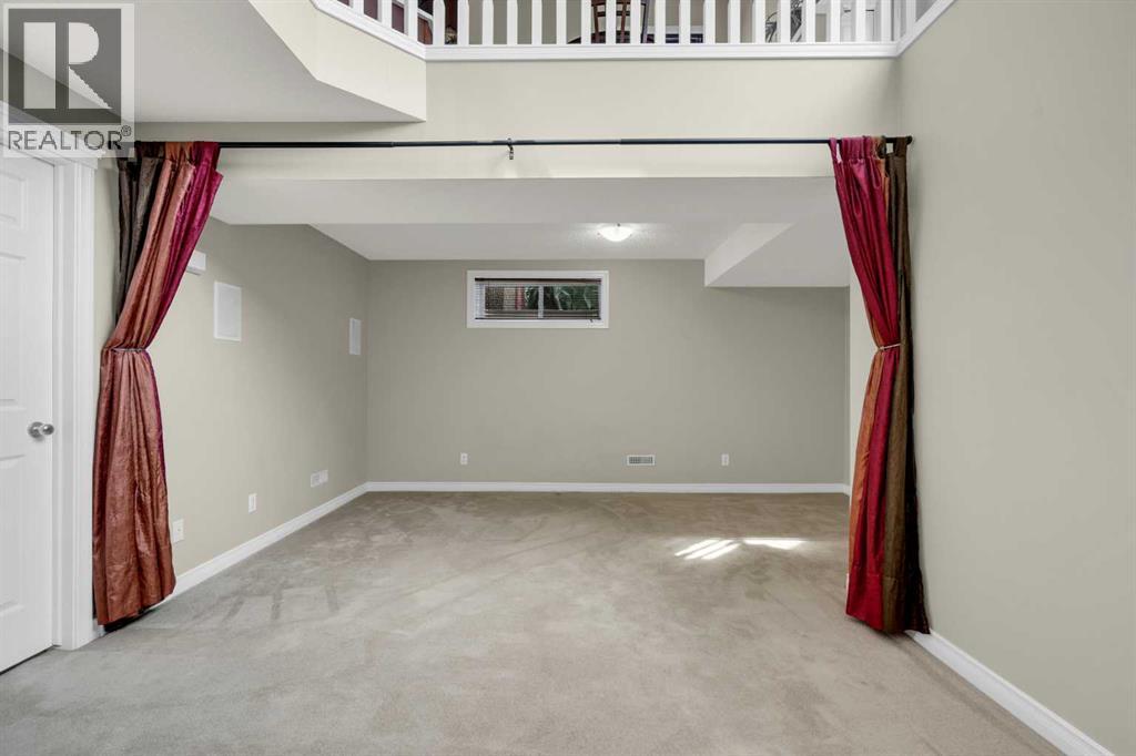 Photo 17 of 169 Crystal Shores Grove, Okotoks AB