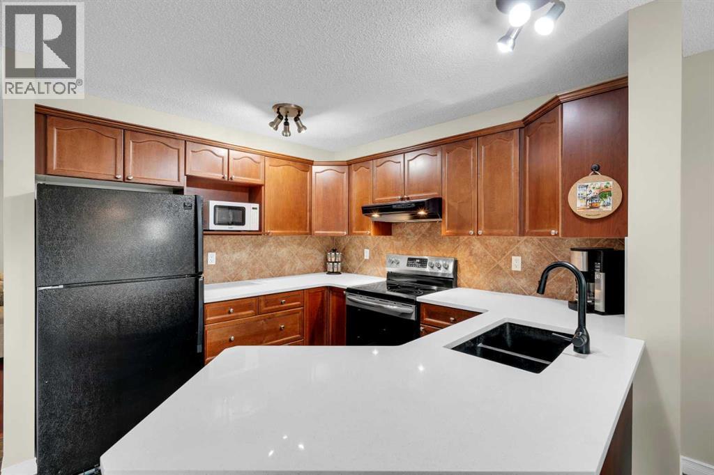 Photo 28 of 169 Crystal Shores Grove, Okotoks AB