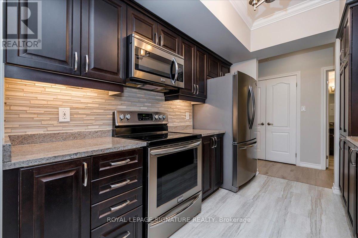 Photo 11 of 301 45 Ferndale Drive S, Barrie ON
