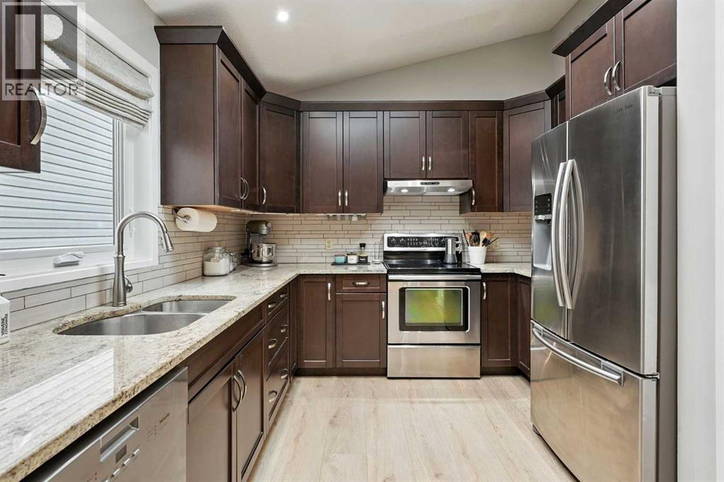 Single Family House 4 Level for Sale in  Macewan Park Circle NW MacEwan Glen Calgary 