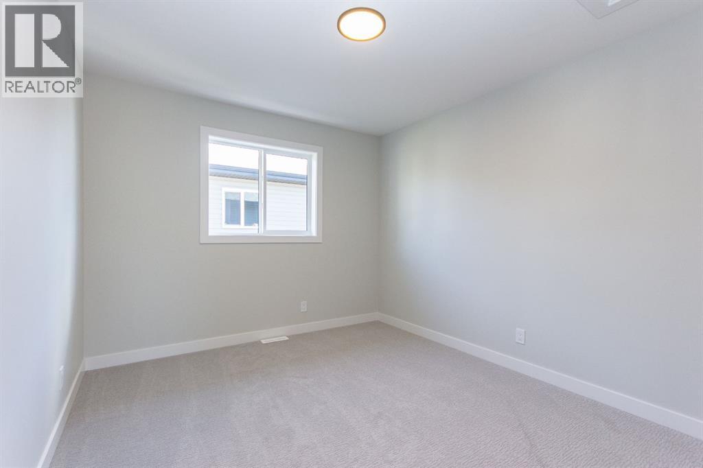 Photo 24 of 75 Bardwell Way, Sylvan Lake AB