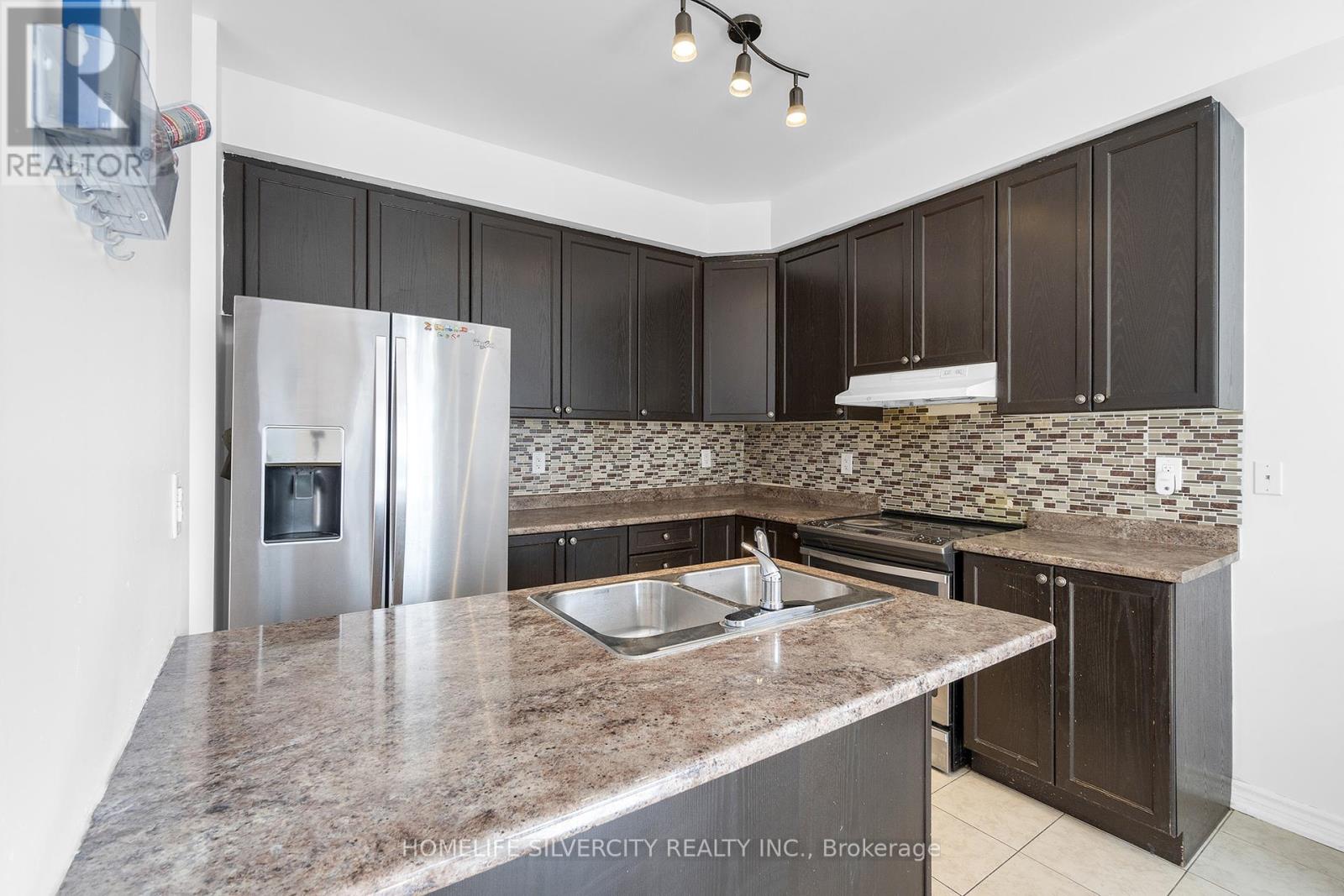 Photo 12 of 93 Education Road, Brampton ON
