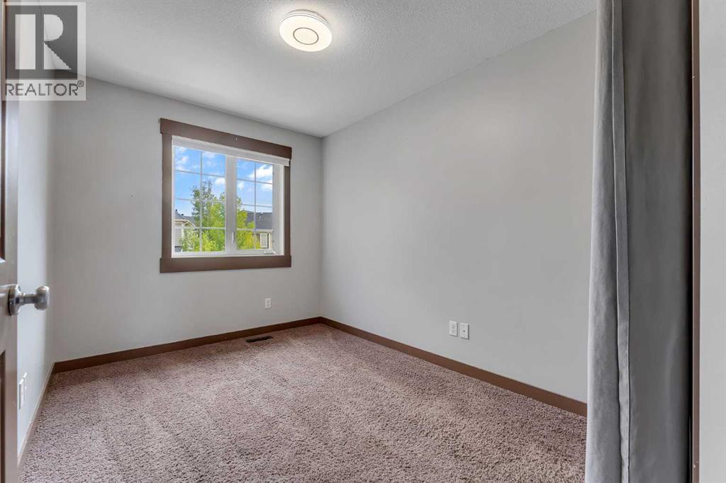 Photo 15 of 185 Rainbow Falls Manor, Chestermere AB