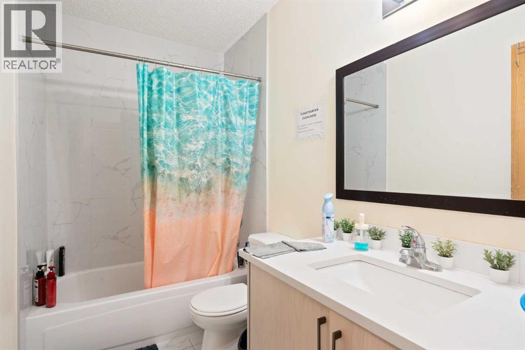 Photo 13 of 319 Rundlelawn Road Ne, Calgary AB