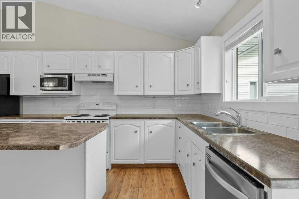 Photo 11 of 1218 Grey Avenue, Crossfield AB