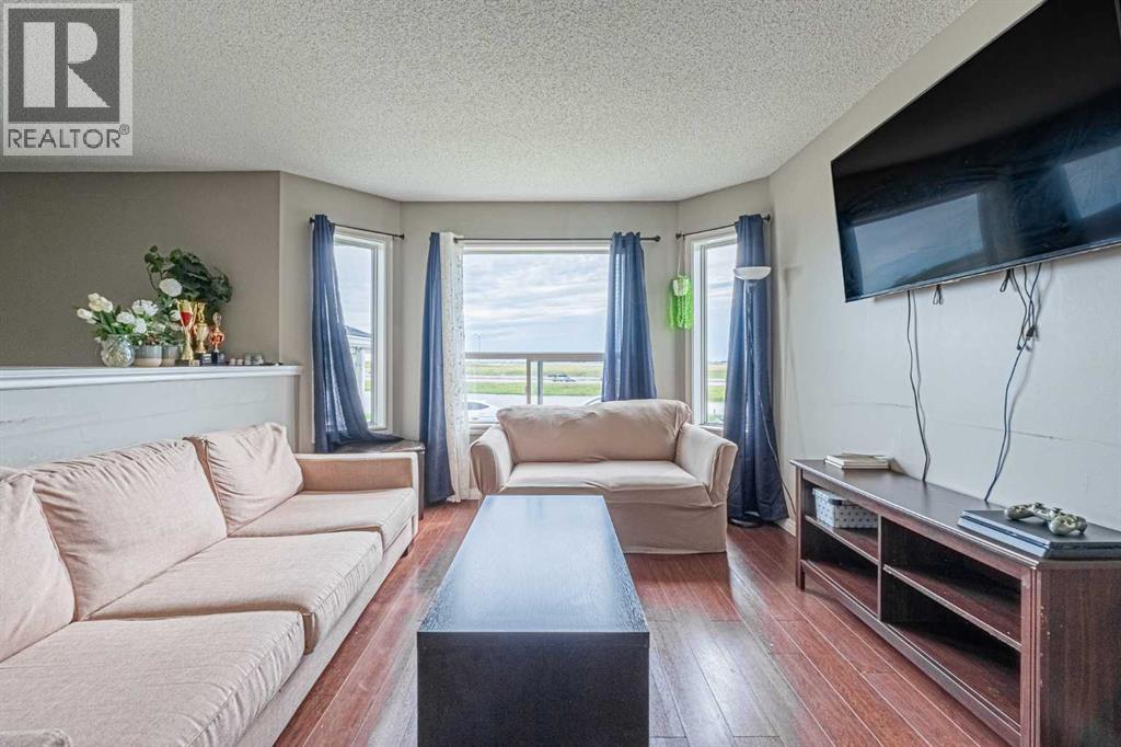 Single Family House Bi-level for Sale in  Appleside Close SE Applewood Park Calgary 