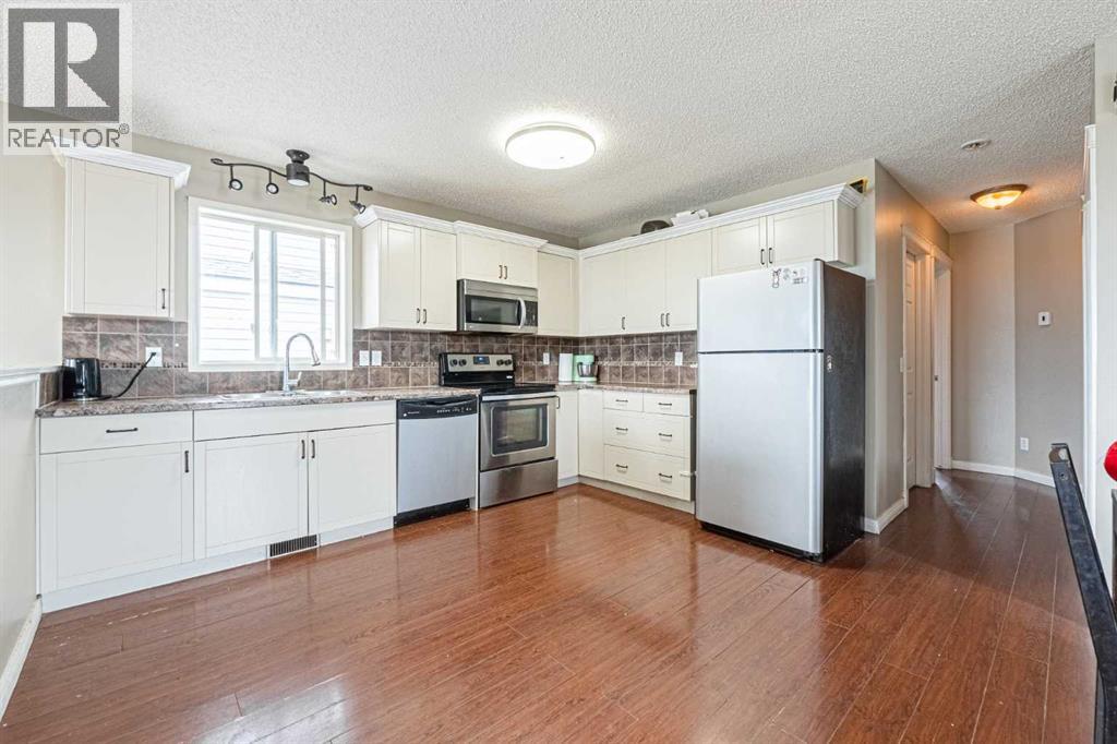 Single Family House Bi-level for Sale in  Appleside Close SE Applewood Park Calgary 