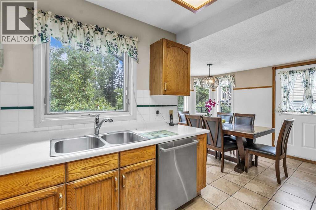 Photo 32 of 183 Macewan Ridge Close Nw, Calgary AB