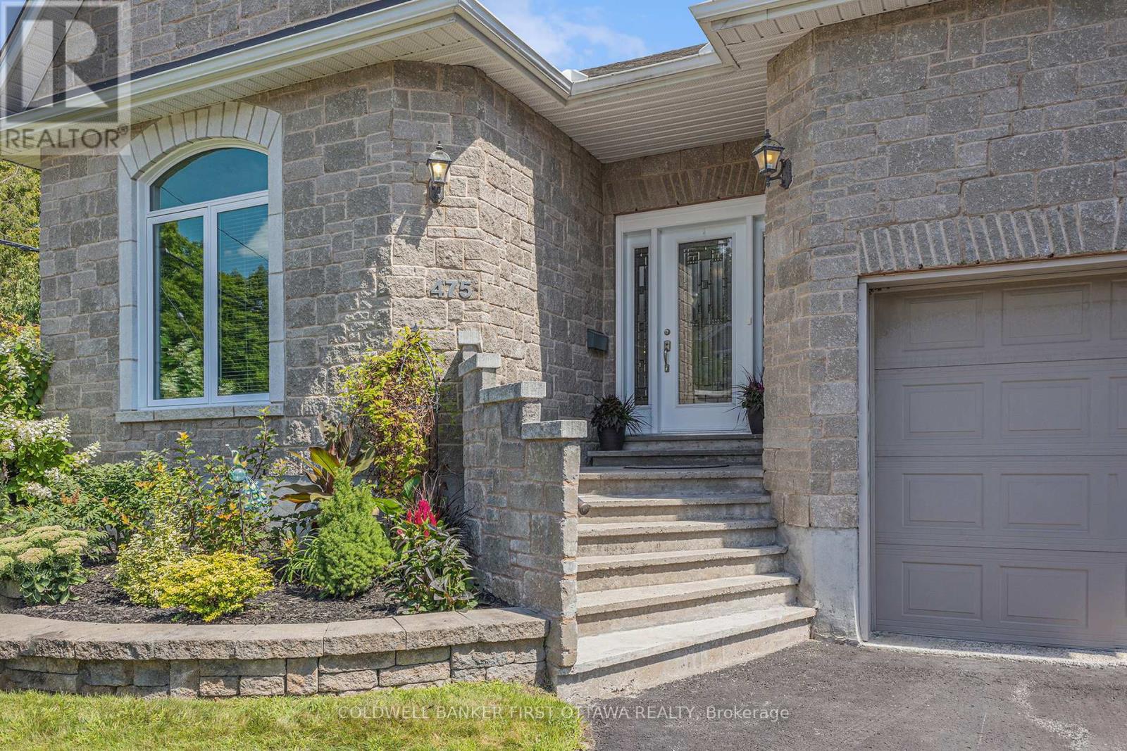 Elegant etched-glass front door welcomes you home